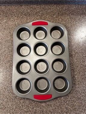 Food Network 12-Cup Gray Muffin Pan with Red Silicone Grips
